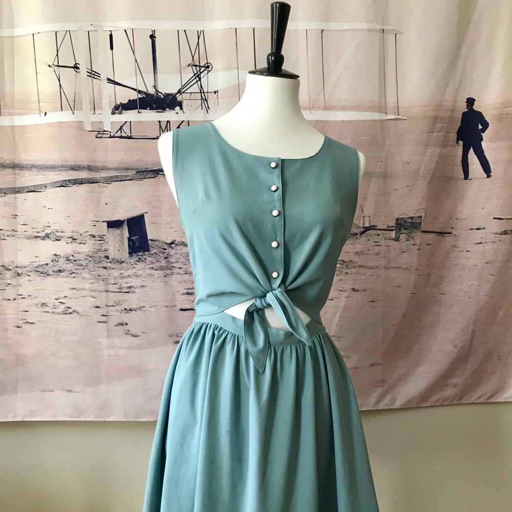 Teal summer dress with buttons and cuttout